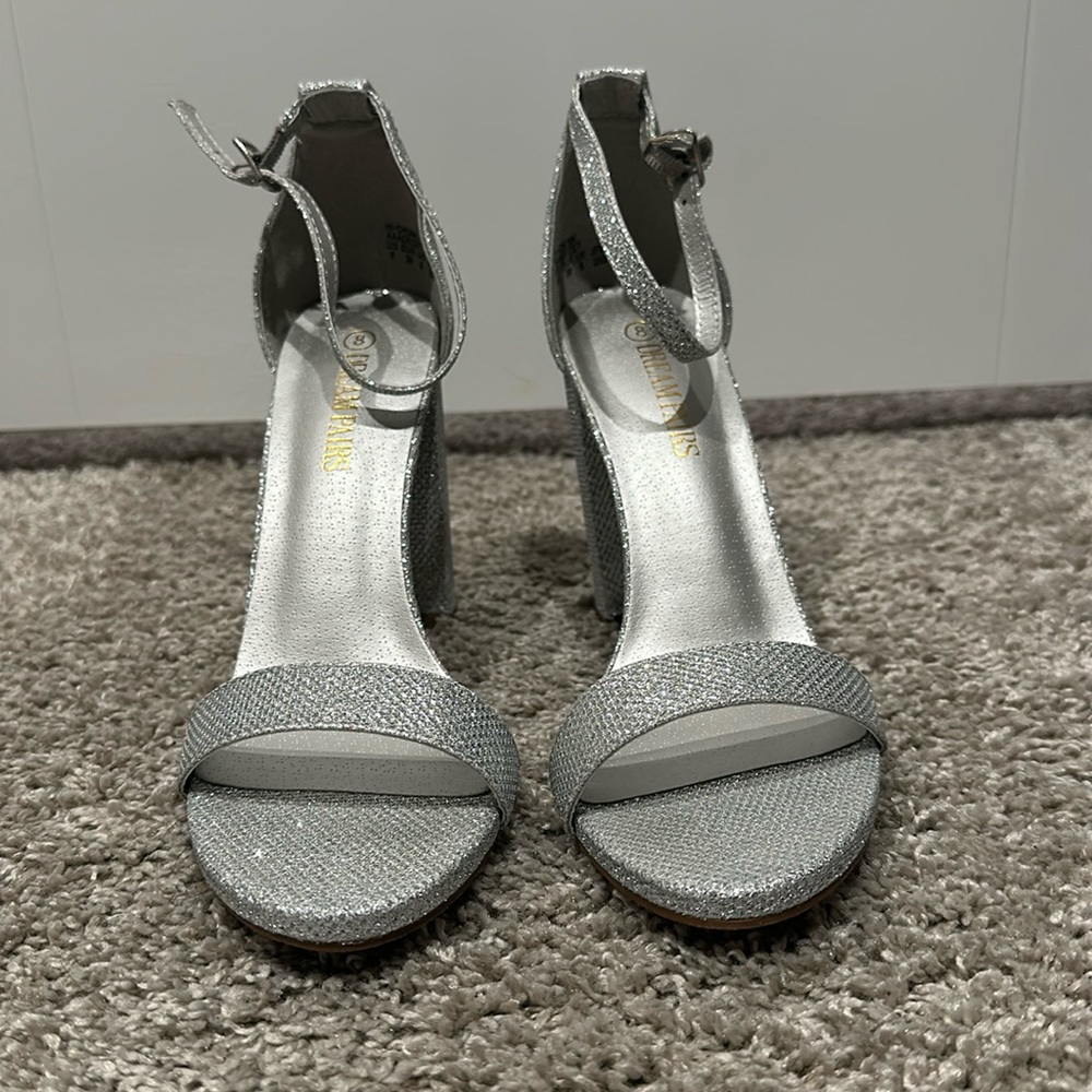 Open toed, chunky heel. Silver sparkle size 8. Worn once for a couple of hours.